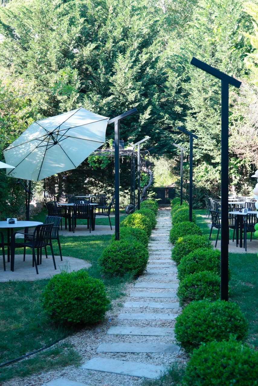 The stone pathway through The Lawn Cafe's garden